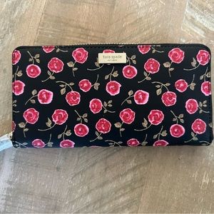 Brand new authentic floral Kate Spade zip wallet. Tag & original packing inside